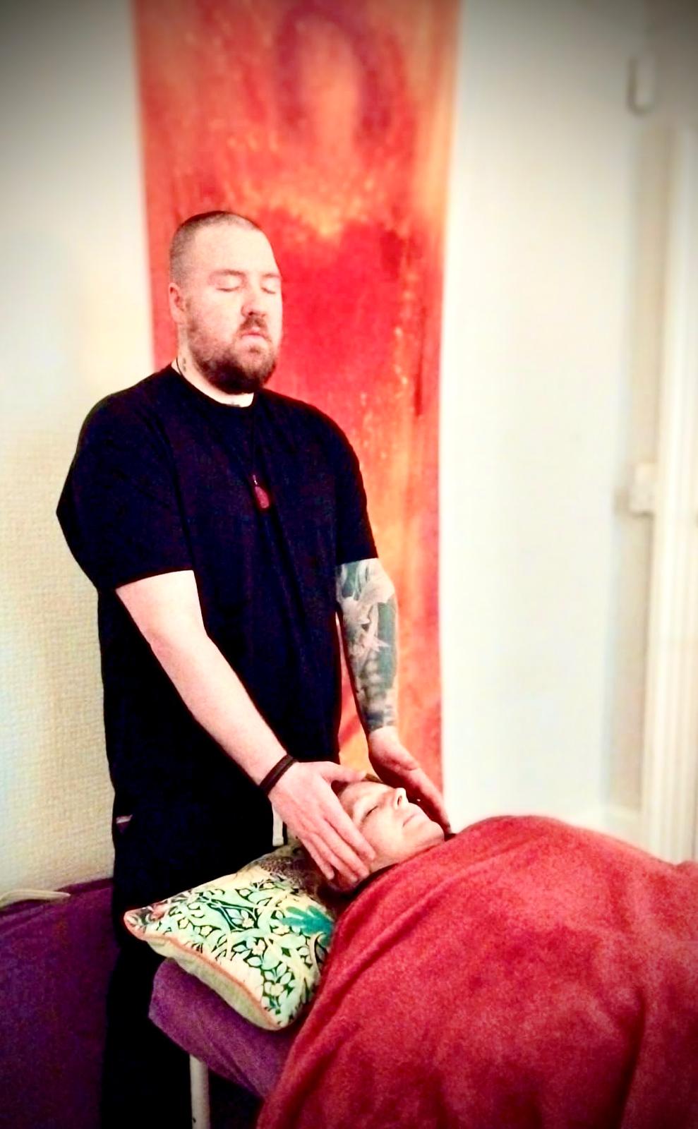 Reiki session in Glasgow — Reiki Glasgow practitioner giving reiki to crown chakra