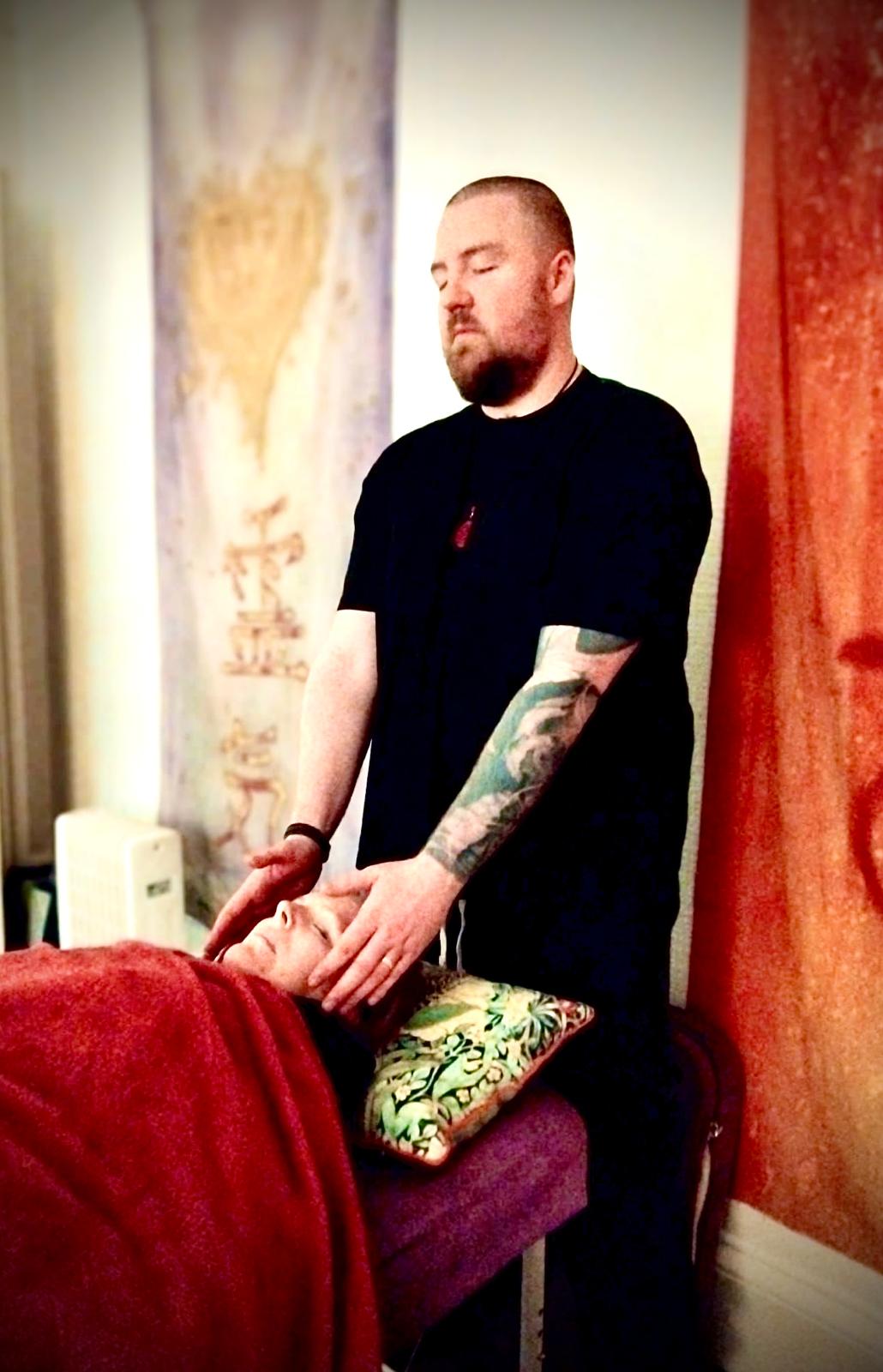 Reiki session in Glasgow — Reiki Glasgow practitioner performing reiki. 